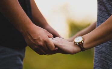 Couple holding hands